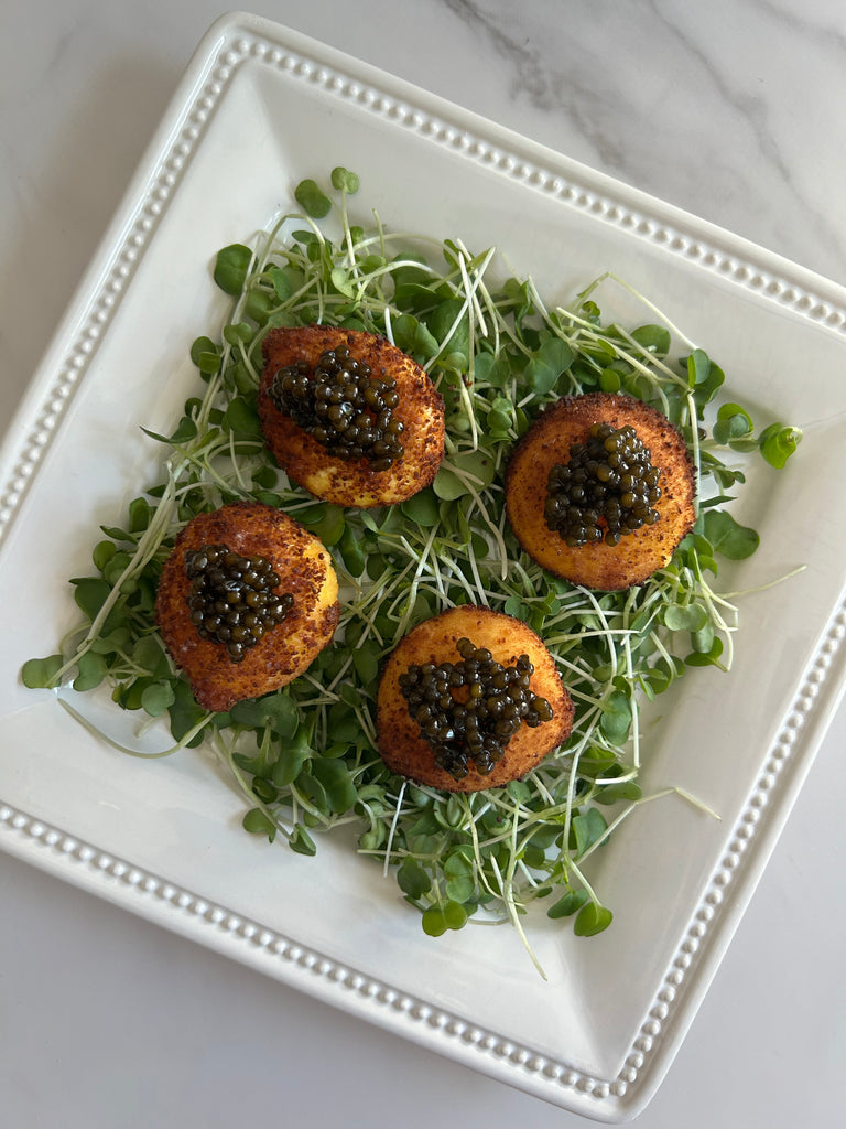 FRIED EGG YOLKS WITH CAVIAR